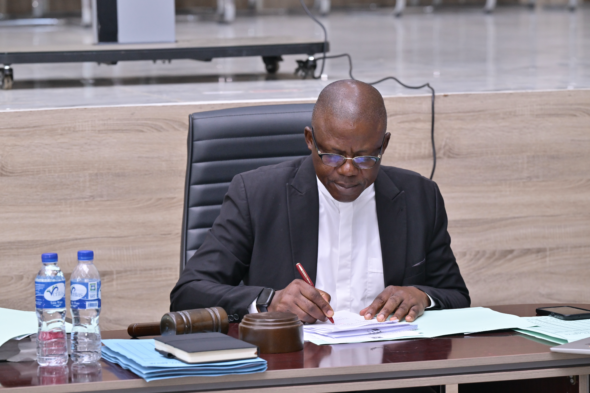 Rev. Fr. Prof. Hyacinth Ichoku, Vice-Chancellor of Veritas University Abuja, in the act of signing the Humanitas AI Compact